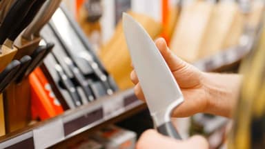 Coles will stop selling kitchen knives nationwide after an employee was stabbed at work