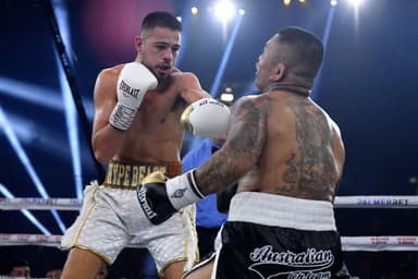 Boxer apologises for State of Origin domestic violence joke