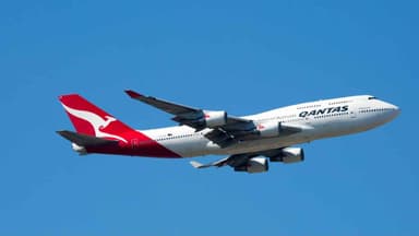 Qantas reports annual profits down 28%
