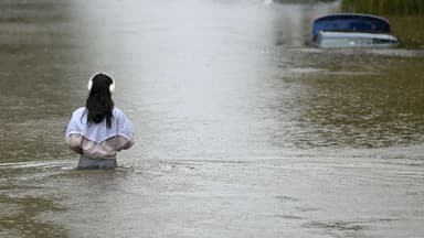 Two ADF trucks rolled over in flood-affected NSW, injuring 13 people.