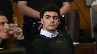 A man has posed as an FBI agent to free Luigi Mangione